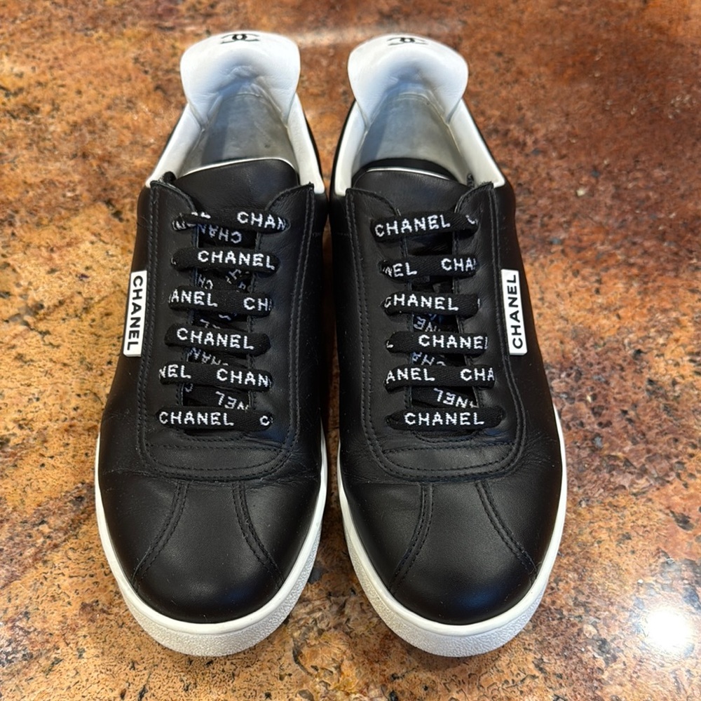 CHANEL Black and White Sneakers Luxury Sporty Design